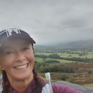 woman in the rain on an ultramarathon 50km trail run